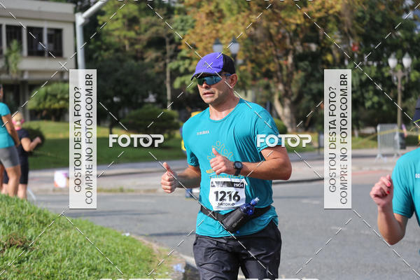 Buy your photos of the eventMeia Maratona Internacional de Curitiba 2018 on Fotop