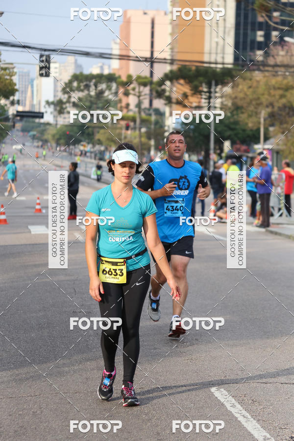 Buy your photos of the eventMeia Maratona Internacional de Curitiba 2018 on Fotop