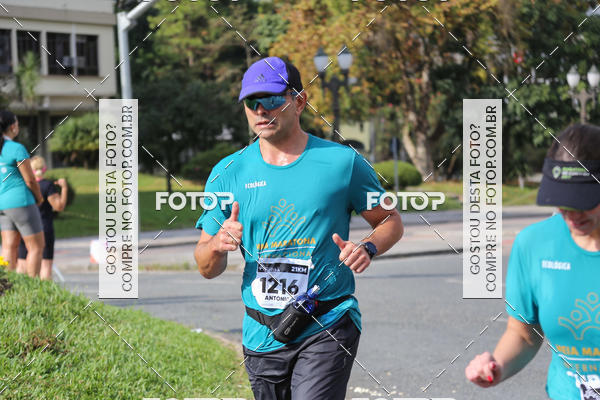 Buy your photos of the eventMeia Maratona Internacional de Curitiba 2018 on Fotop