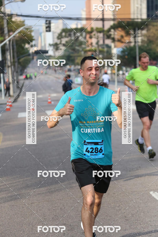 Buy your photos of the eventMeia Maratona Internacional de Curitiba 2018 on Fotop
