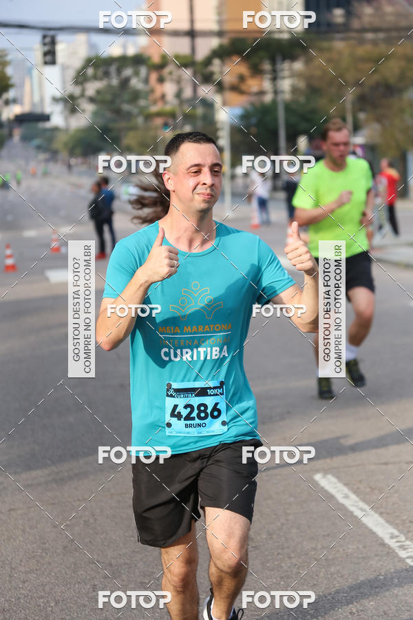 Buy your photos of the eventMeia Maratona Internacional de Curitiba 2018 on Fotop