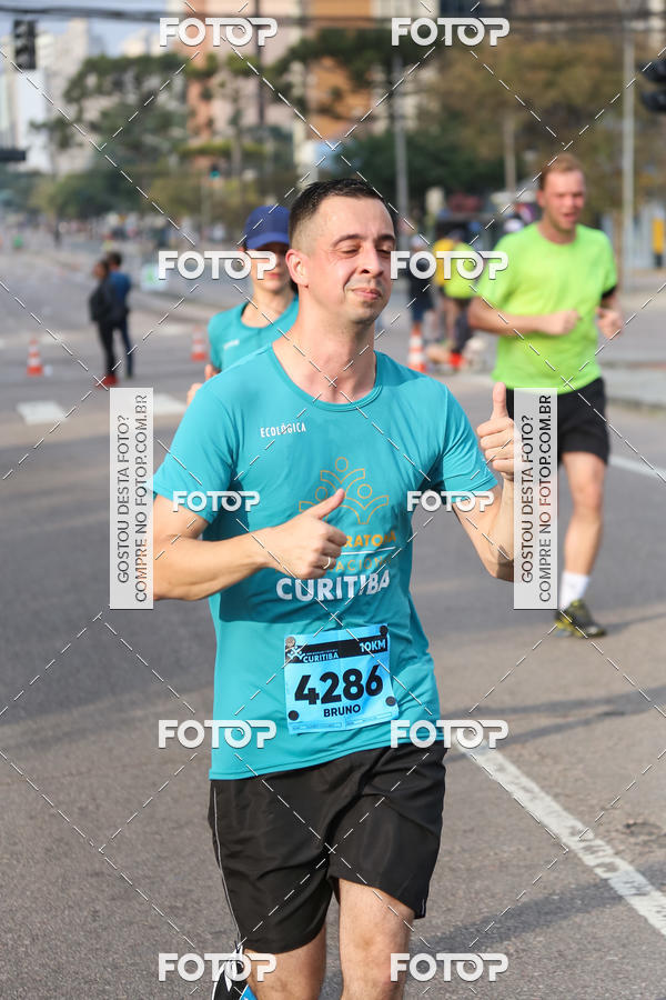 Buy your photos of the eventMeia Maratona Internacional de Curitiba 2018 on Fotop