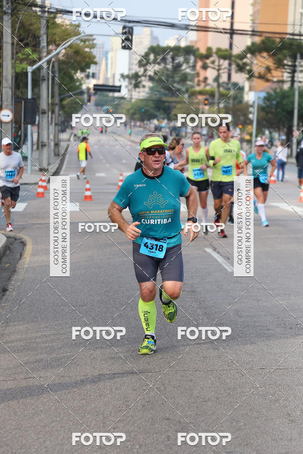 Buy your photos of the eventMeia Maratona Internacional de Curitiba 2018 on Fotop