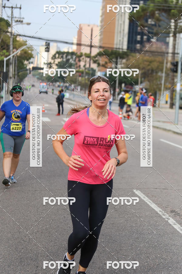 Buy your photos of the eventMeia Maratona Internacional de Curitiba 2018 on Fotop