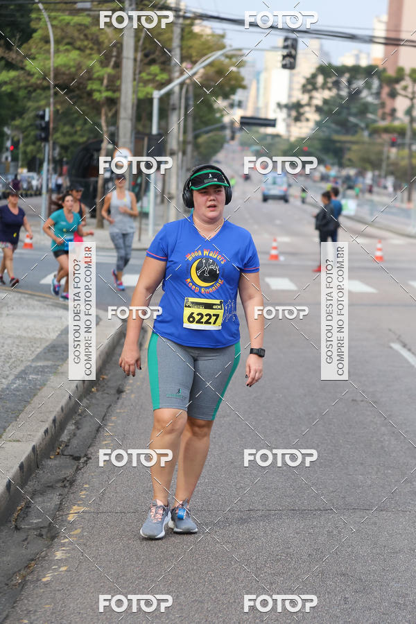Buy your photos of the eventMeia Maratona Internacional de Curitiba 2018 on Fotop