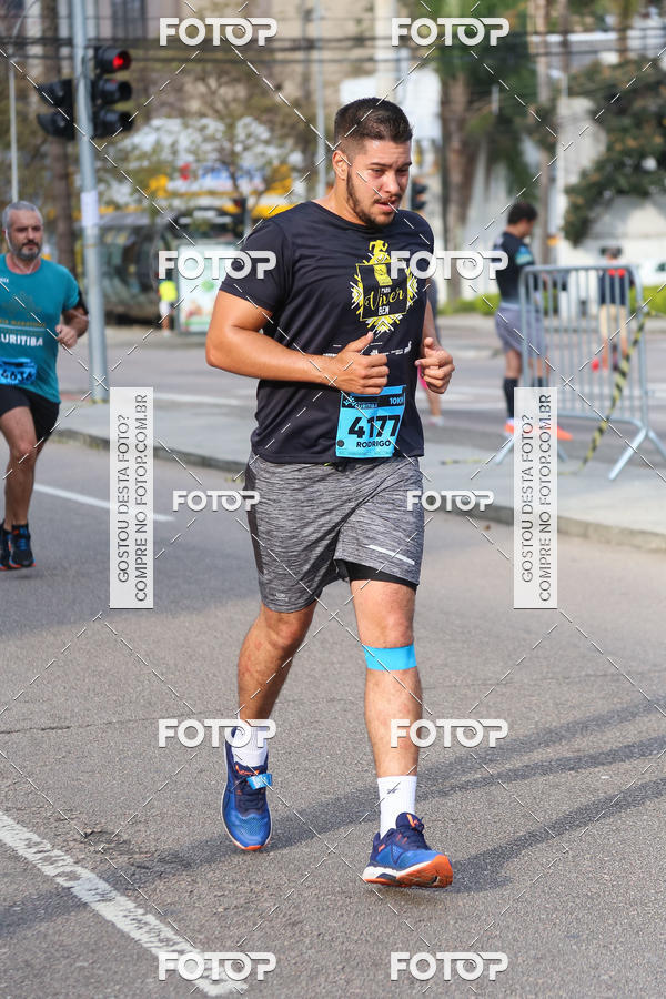 Buy your photos of the eventMeia Maratona Internacional de Curitiba 2018 on Fotop