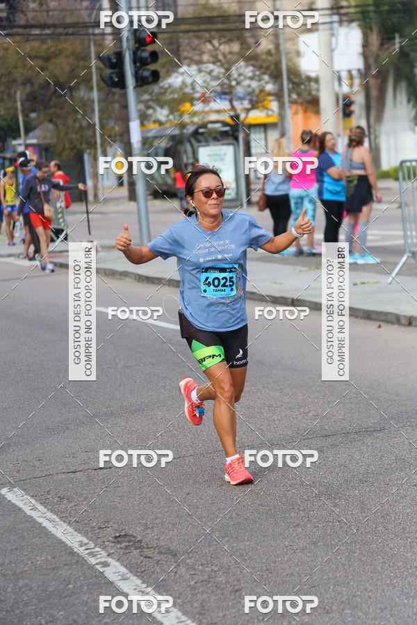 Buy your photos of the eventMeia Maratona Internacional de Curitiba 2018 on Fotop