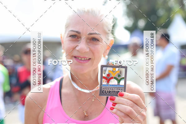 Buy your photos of the eventMeia Maratona Internacional de Curitiba 2018 on Fotop