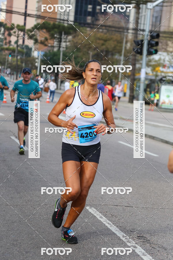 Buy your photos of the eventMeia Maratona Internacional de Curitiba 2018 on Fotop