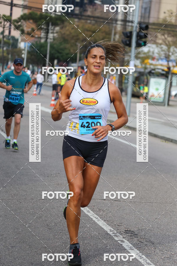 Buy your photos of the eventMeia Maratona Internacional de Curitiba 2018 on Fotop