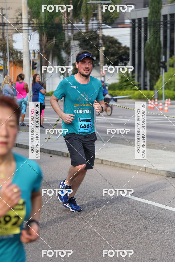 Buy your photos of the eventMeia Maratona Internacional de Curitiba 2018 on Fotop