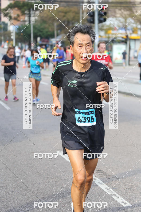 Buy your photos of the eventMeia Maratona Internacional de Curitiba 2018 on Fotop