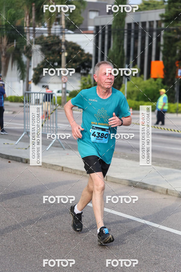 Buy your photos of the eventMeia Maratona Internacional de Curitiba 2018 on Fotop
