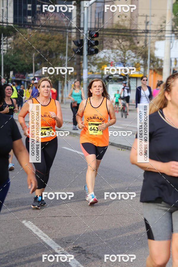 Buy your photos of the eventMeia Maratona Internacional de Curitiba 2018 on Fotop