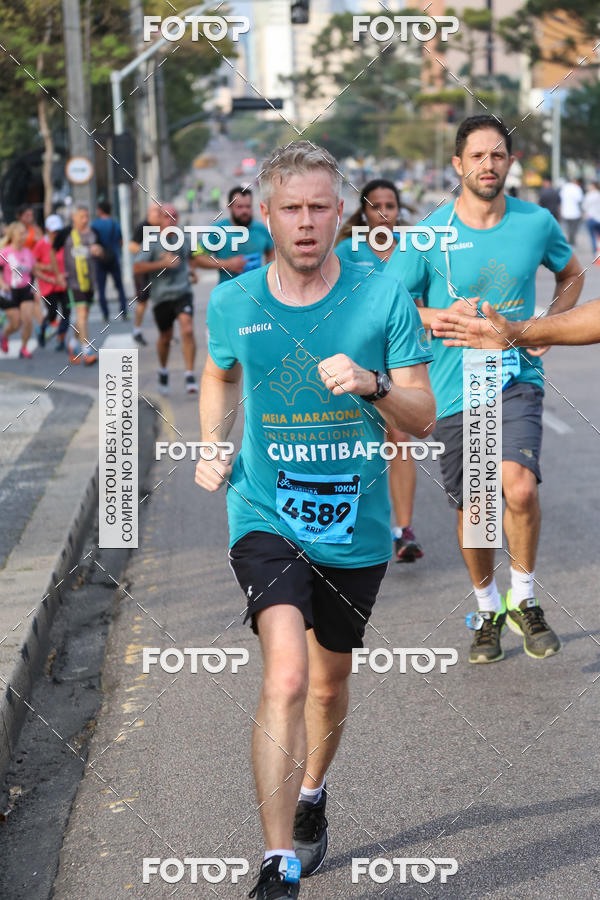 Buy your photos of the eventMeia Maratona Internacional de Curitiba 2018 on Fotop