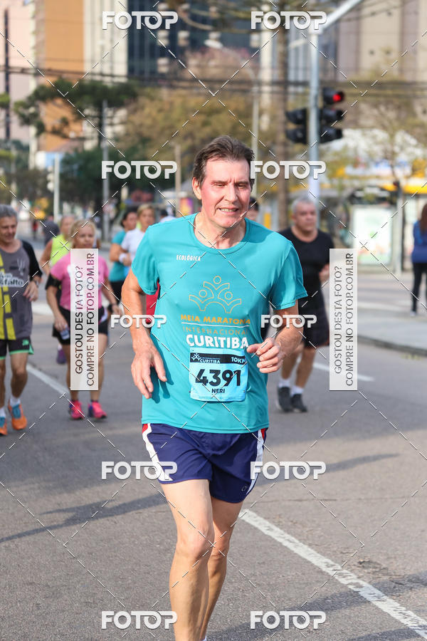 Buy your photos of the eventMeia Maratona Internacional de Curitiba 2018 on Fotop