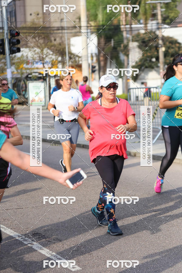 Buy your photos of the eventMeia Maratona Internacional de Curitiba 2018 on Fotop