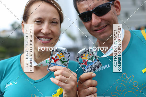Buy your photos of the eventMeia Maratona Internacional de Curitiba 2018 on Fotop