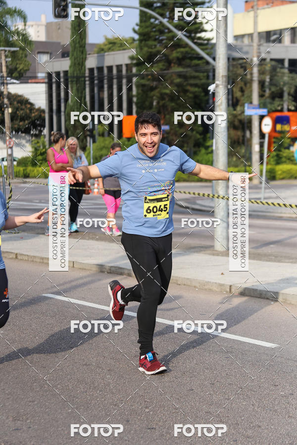 Buy your photos of the eventMeia Maratona Internacional de Curitiba 2018 on Fotop