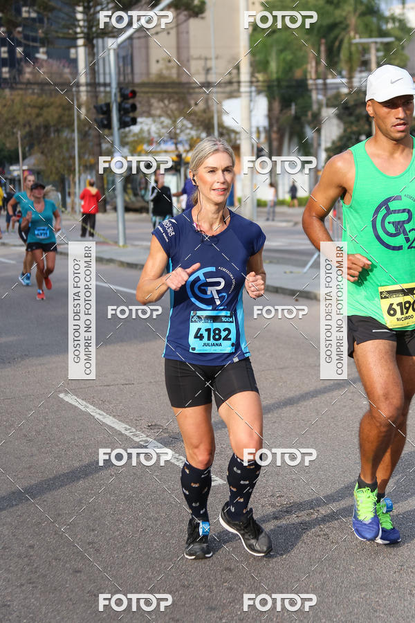 Buy your photos of the eventMeia Maratona Internacional de Curitiba 2018 on Fotop