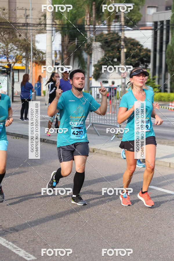 Buy your photos of the eventMeia Maratona Internacional de Curitiba 2018 on Fotop