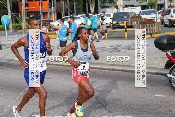 Buy your photos of the eventMeia Maratona Internacional de Curitiba 2018 on Fotop