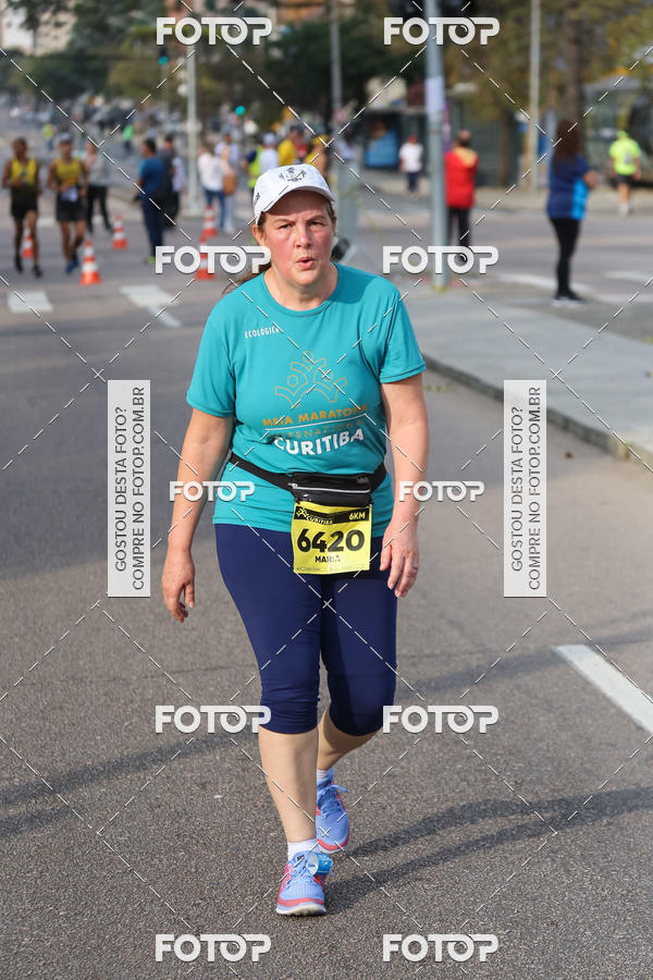 Buy your photos of the eventMeia Maratona Internacional de Curitiba 2018 on Fotop