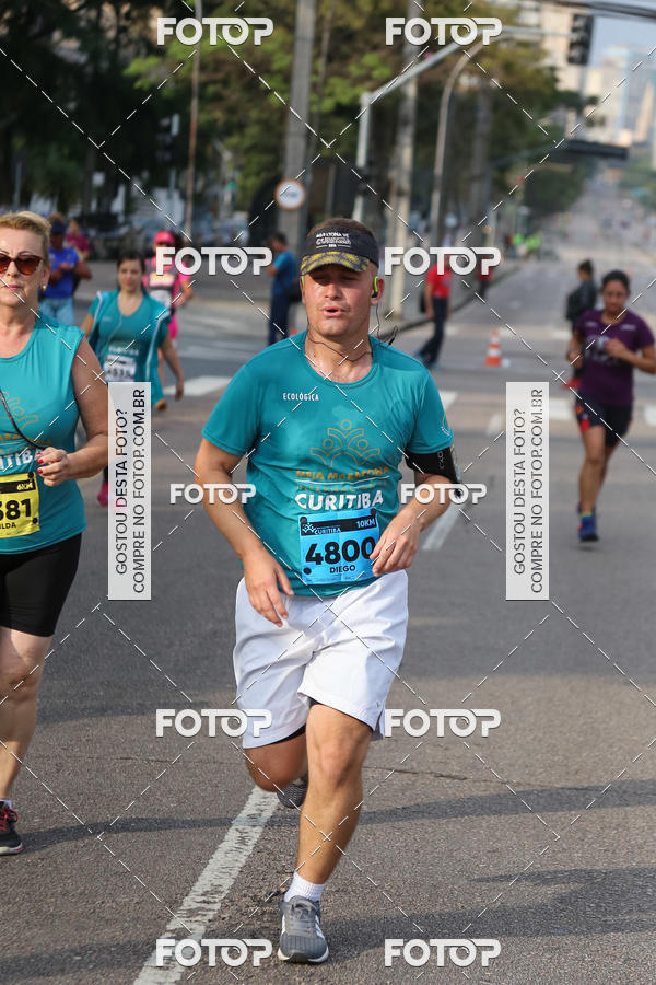Buy your photos of the eventMeia Maratona Internacional de Curitiba 2018 on Fotop