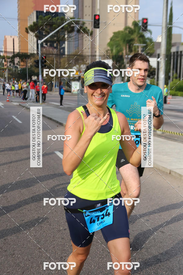 Buy your photos of the eventMeia Maratona Internacional de Curitiba 2018 on Fotop
