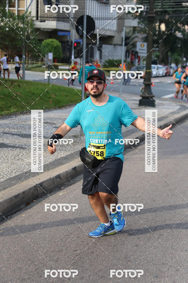 Buy your photos of the eventMeia Maratona Internacional de Curitiba 2018 on Fotop
