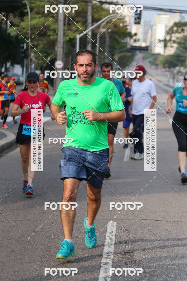 Buy your photos of the eventMeia Maratona Internacional de Curitiba 2018 on Fotop