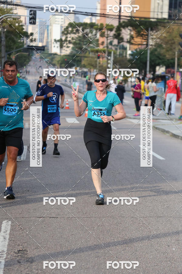 Buy your photos of the eventMeia Maratona Internacional de Curitiba 2018 on Fotop
