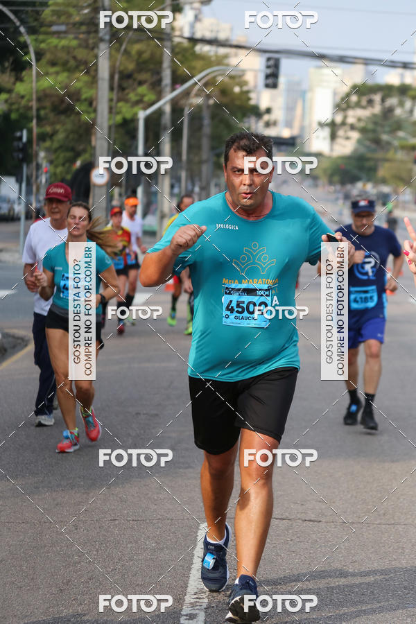 Buy your photos of the eventMeia Maratona Internacional de Curitiba 2018 on Fotop
