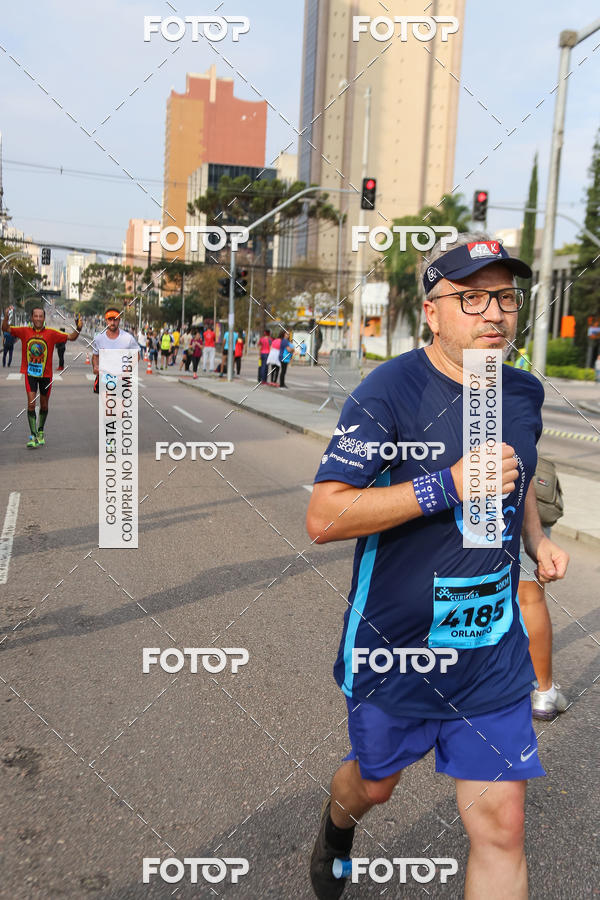 Buy your photos of the eventMeia Maratona Internacional de Curitiba 2018 on Fotop