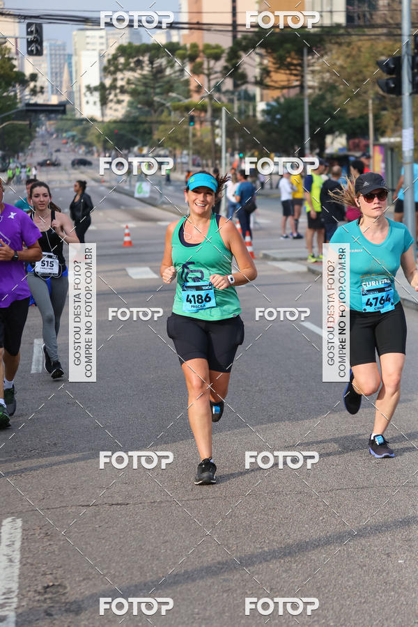 Buy your photos of the eventMeia Maratona Internacional de Curitiba 2018 on Fotop