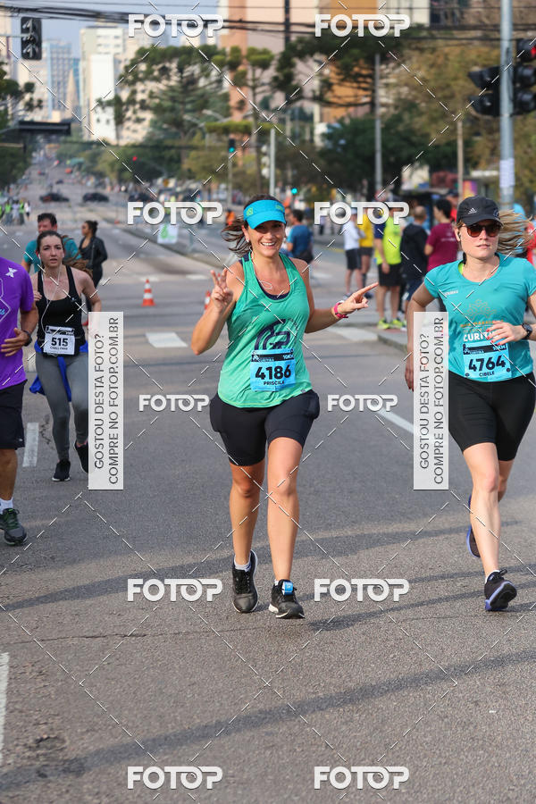 Buy your photos of the eventMeia Maratona Internacional de Curitiba 2018 on Fotop
