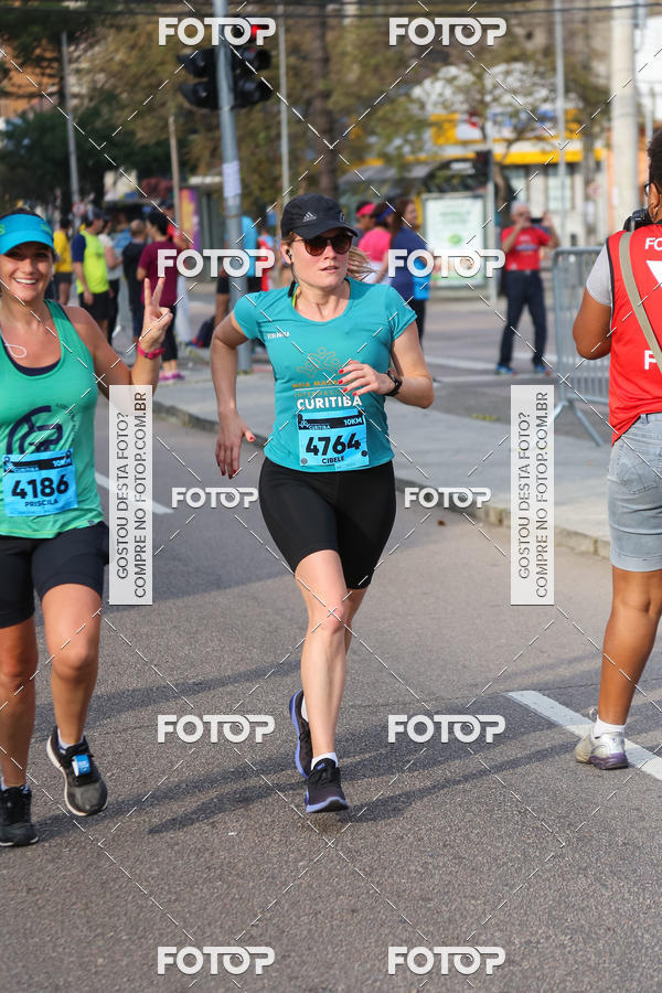 Buy your photos of the eventMeia Maratona Internacional de Curitiba 2018 on Fotop
