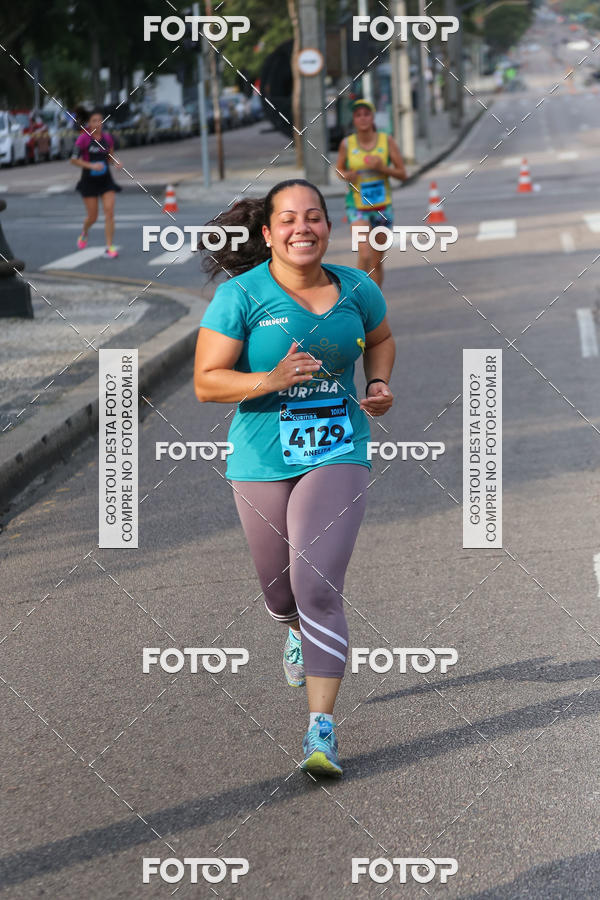 Buy your photos of the eventMeia Maratona Internacional de Curitiba 2018 on Fotop