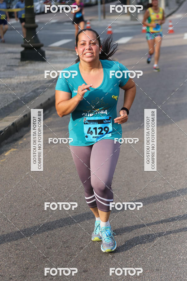 Buy your photos of the eventMeia Maratona Internacional de Curitiba 2018 on Fotop