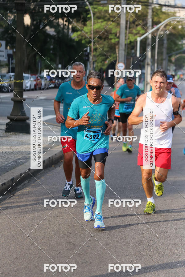 Buy your photos of the eventMeia Maratona Internacional de Curitiba 2018 on Fotop