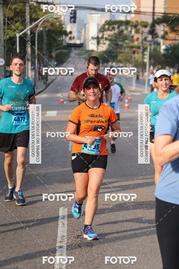 Buy your photos of the eventMeia Maratona Internacional de Curitiba 2018 on Fotop