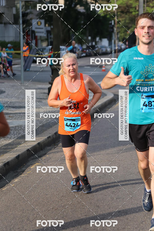 Buy your photos of the eventMeia Maratona Internacional de Curitiba 2018 on Fotop