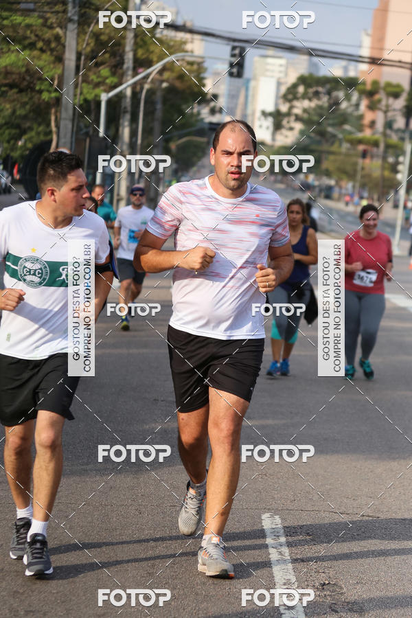 Buy your photos of the eventMeia Maratona Internacional de Curitiba 2018 on Fotop
