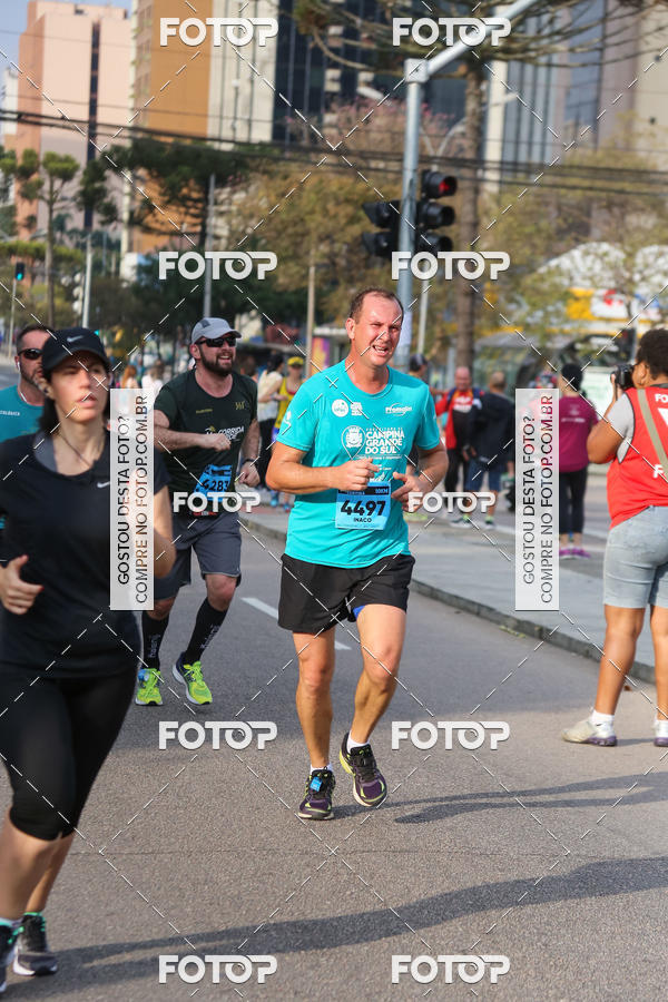 Buy your photos of the eventMeia Maratona Internacional de Curitiba 2018 on Fotop