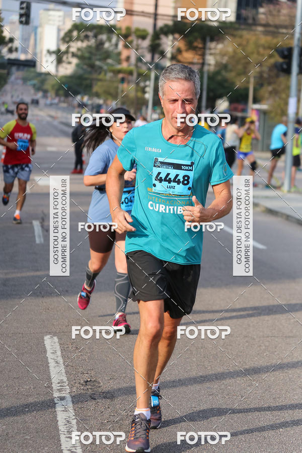 Buy your photos of the eventMeia Maratona Internacional de Curitiba 2018 on Fotop