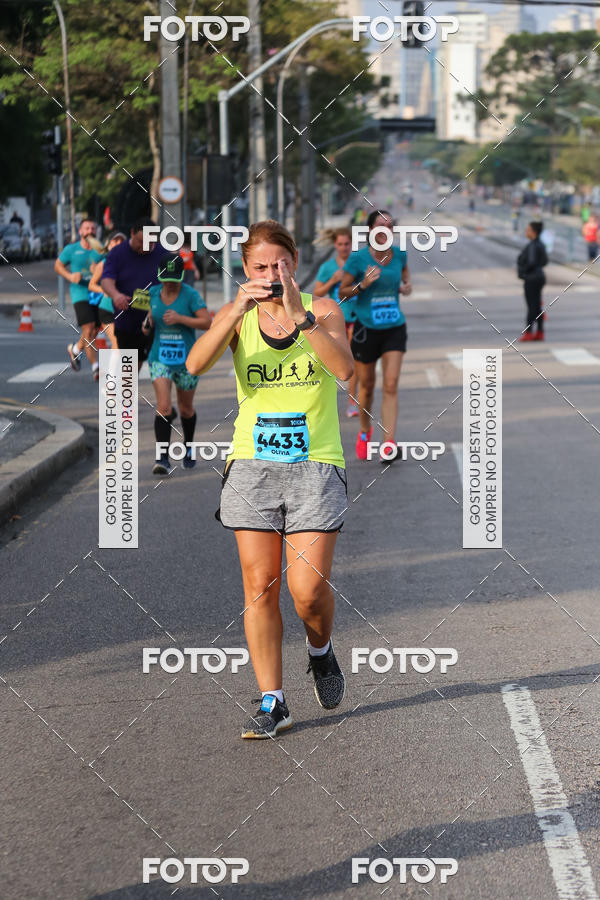 Buy your photos of the eventMeia Maratona Internacional de Curitiba 2018 on Fotop