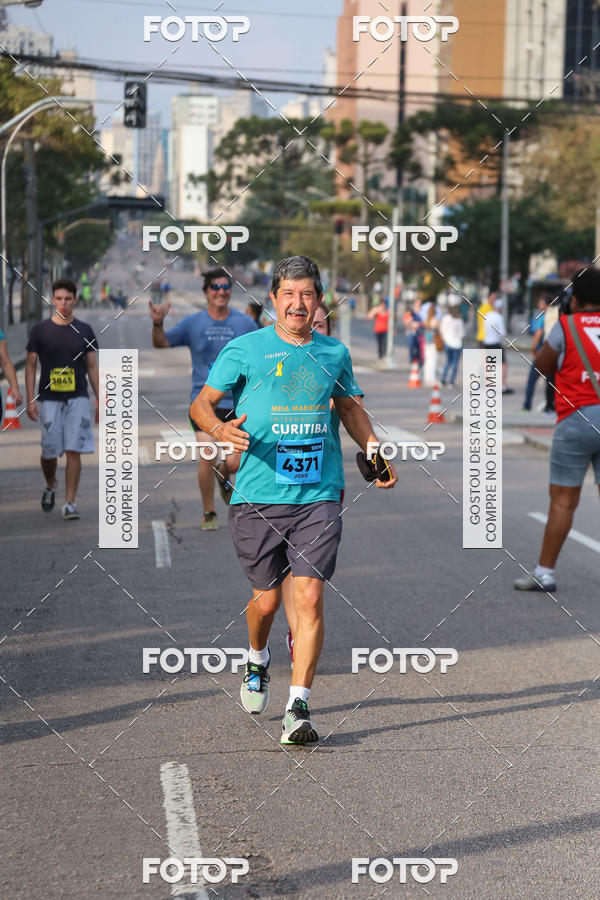 Buy your photos of the eventMeia Maratona Internacional de Curitiba 2018 on Fotop