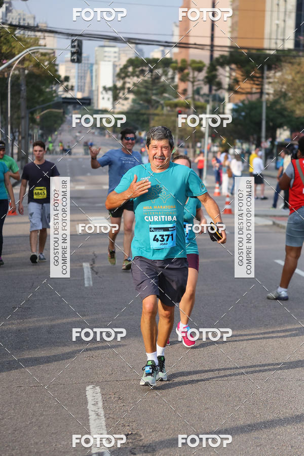 Buy your photos of the eventMeia Maratona Internacional de Curitiba 2018 on Fotop