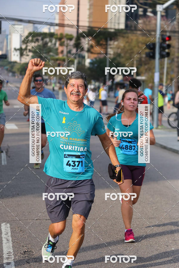 Buy your photos of the eventMeia Maratona Internacional de Curitiba 2018 on Fotop