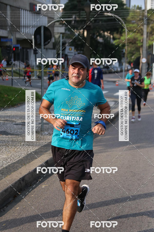 Buy your photos of the eventMeia Maratona Internacional de Curitiba 2018 on Fotop